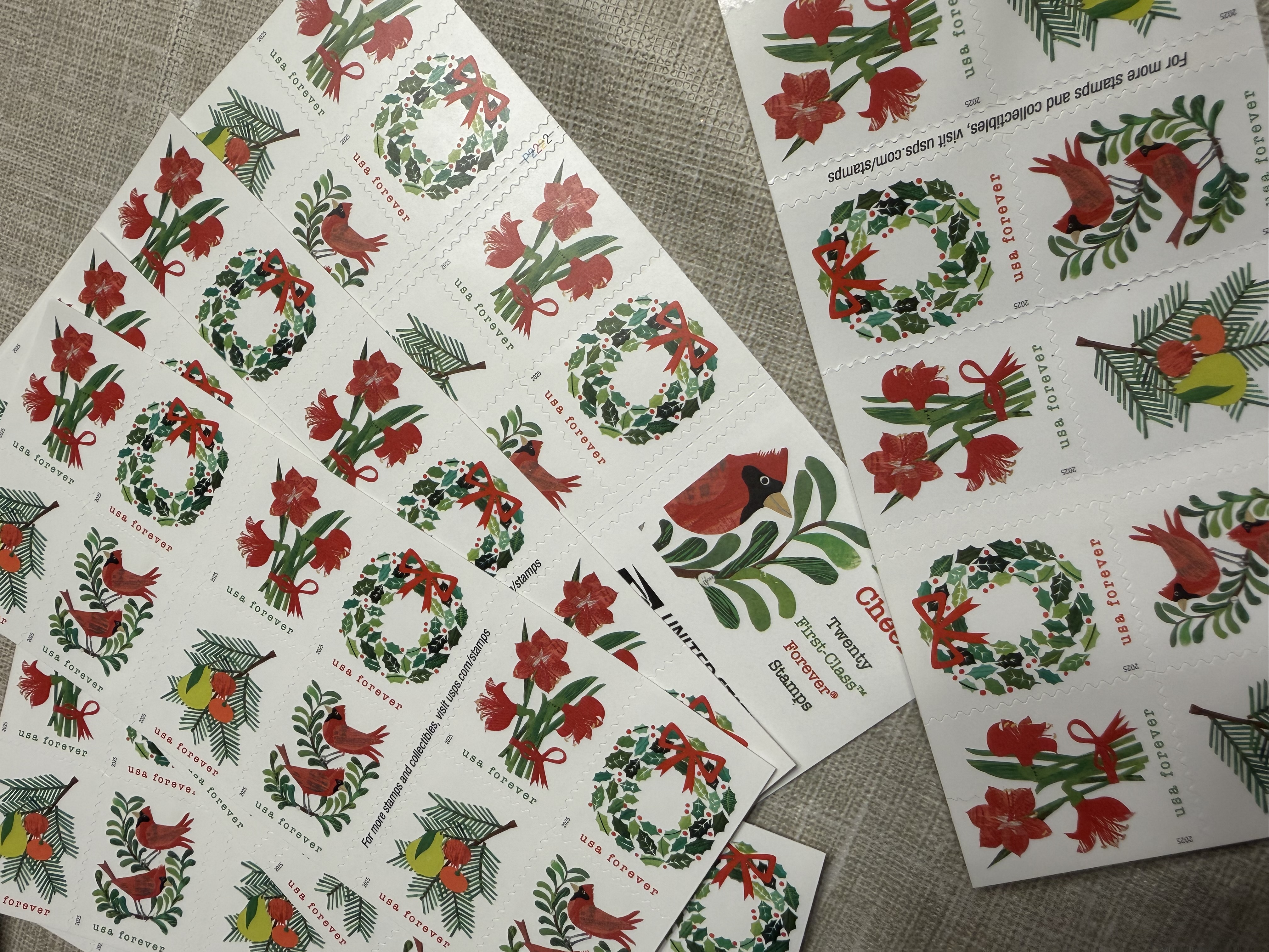 Close up of hand writing a personal note on a Christmas card