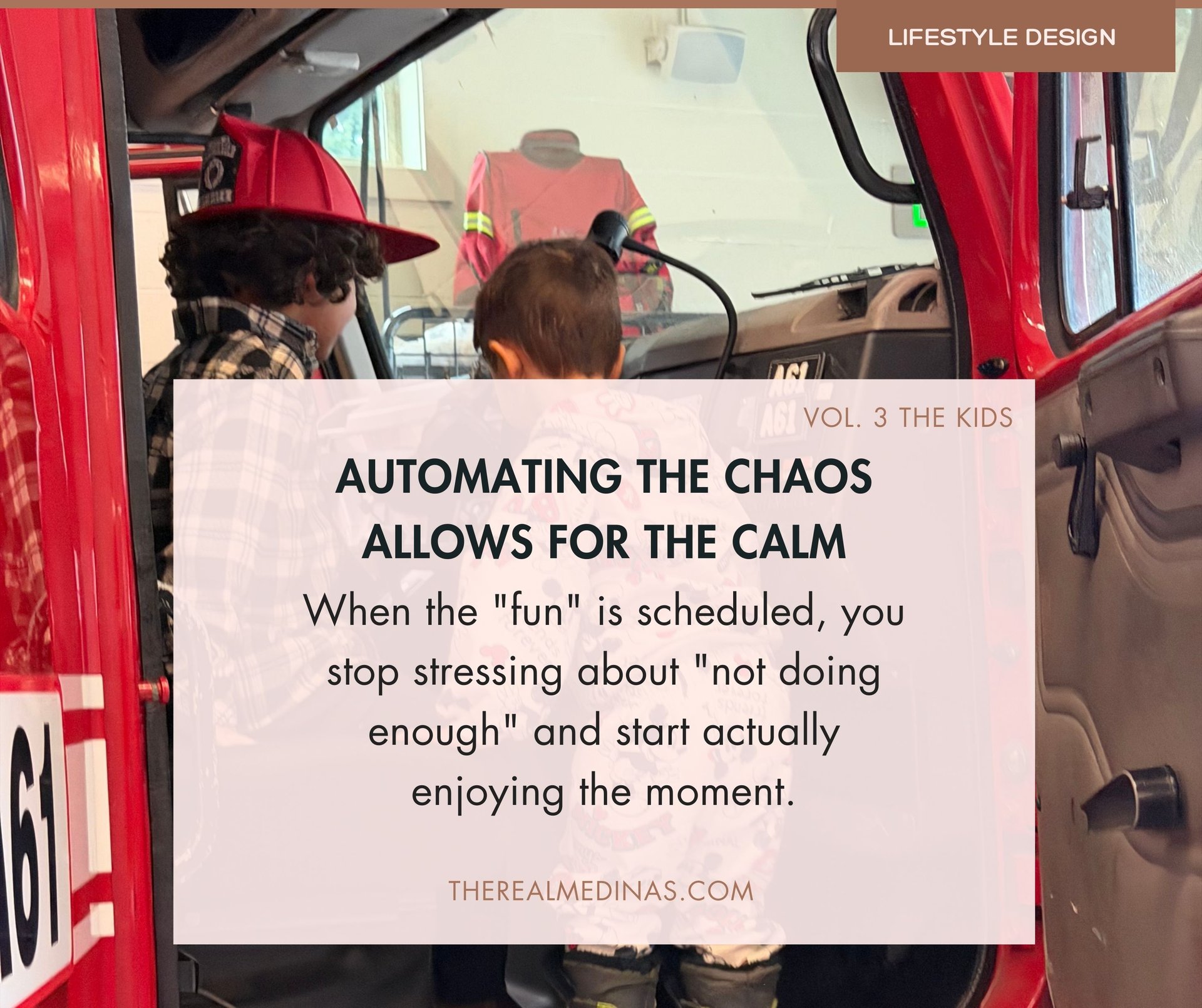 Two young children play inside a bright red firetruck. Automating the chaos allows for the calm.